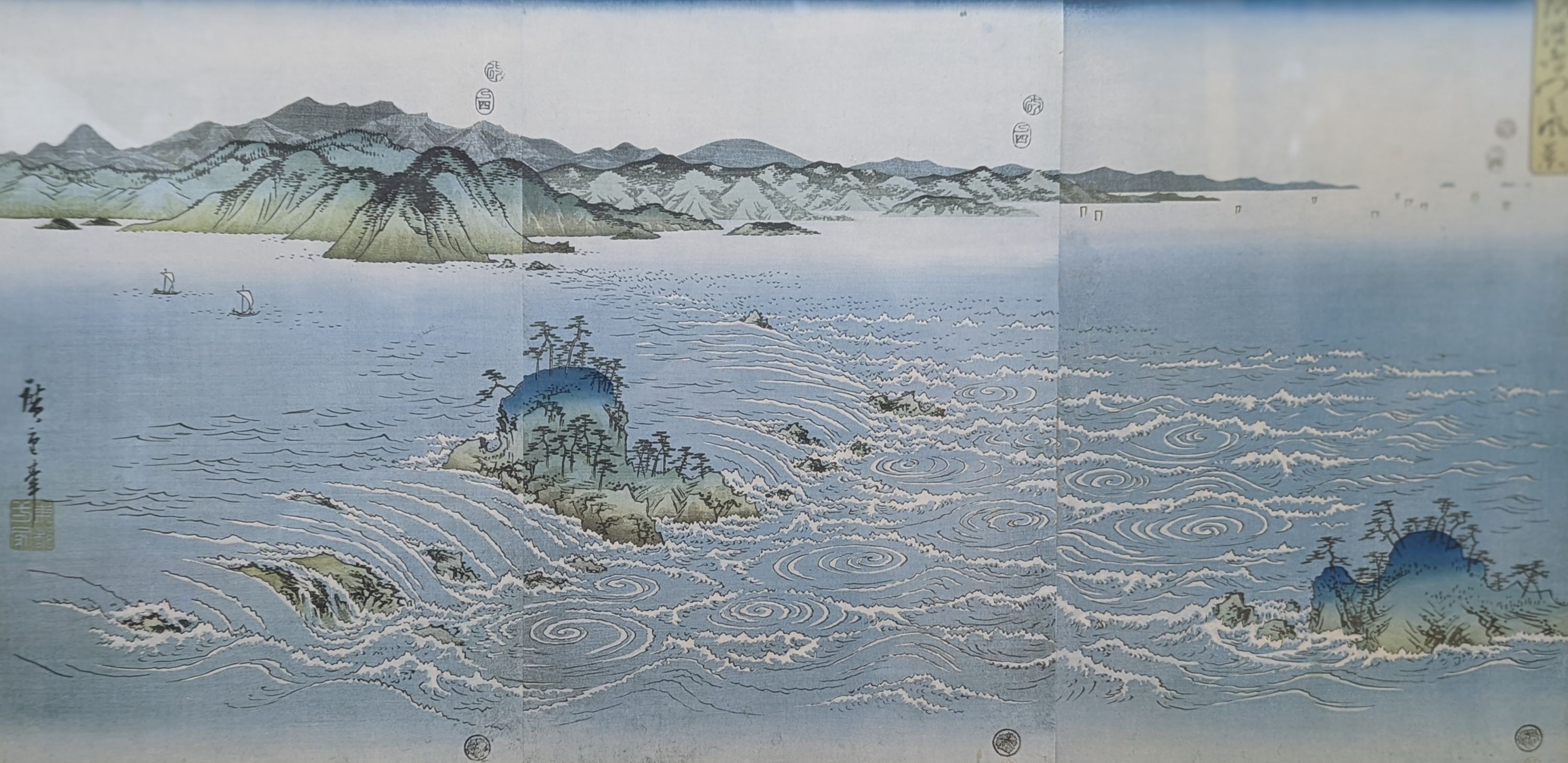 Japanese School, woodblock triptych, Coastal landscape, overall 32 x 66cm